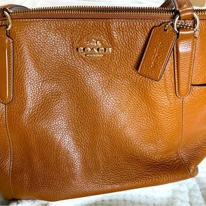 Coach purse. Brown soft leather with gold accents very good condition $60